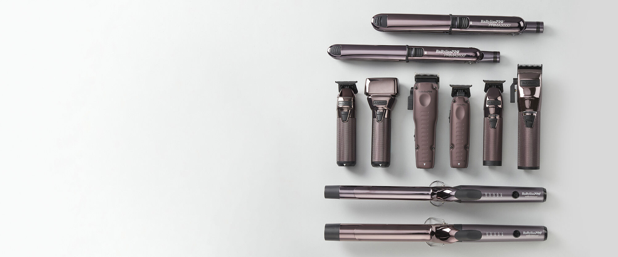 Collection of curling irons, flat irons and barber tools